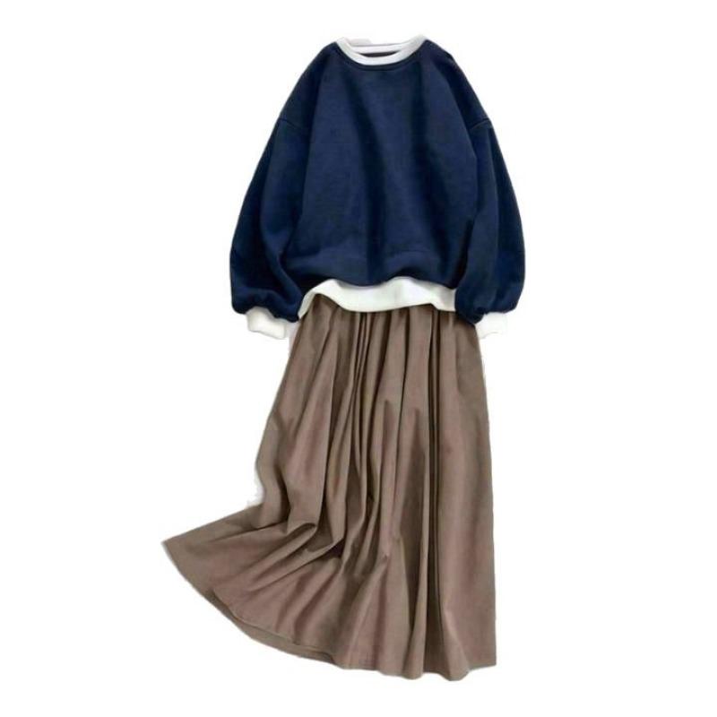 New solid color top + pleated skirt knitted suit fashionable