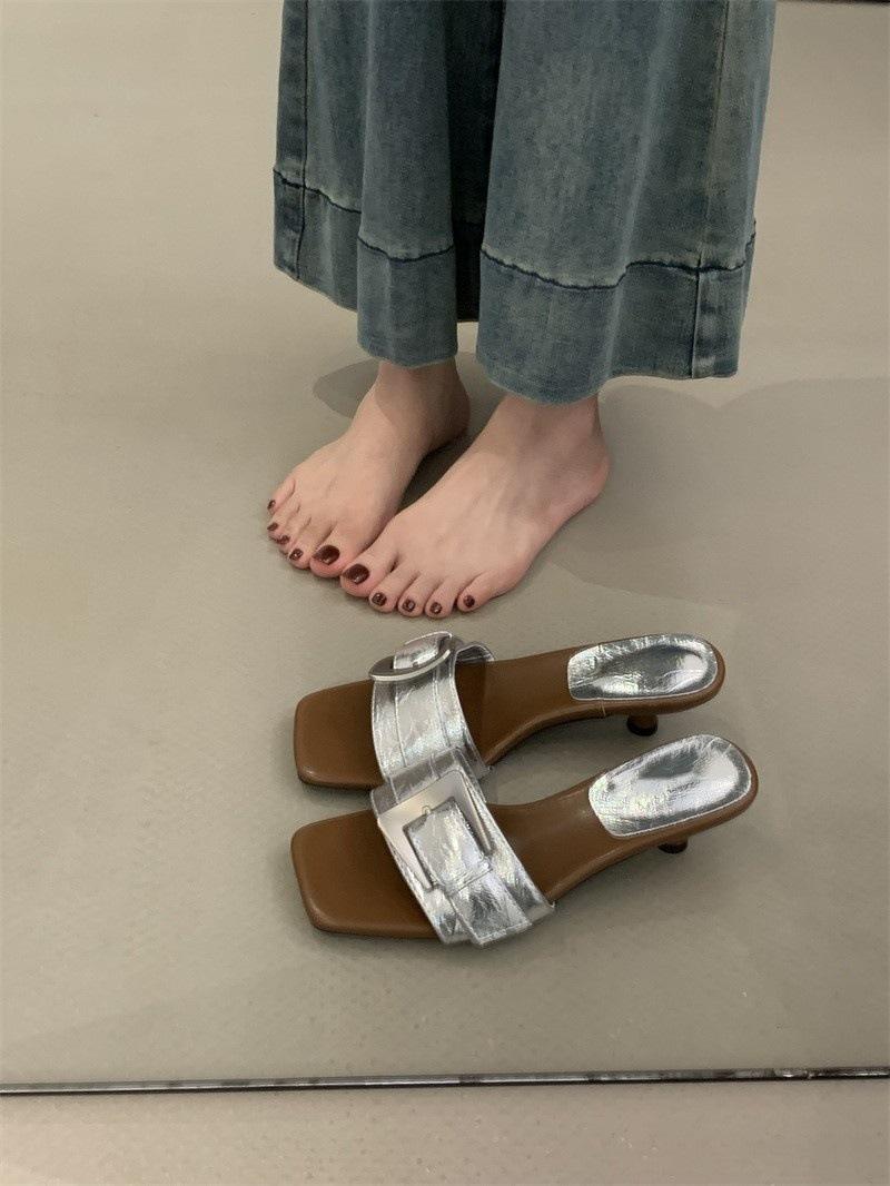

Slippers women s new outer wear summer thin heel one-word drag women s shoes with skirt square head sandals high heel cool slippers 40 серебряный