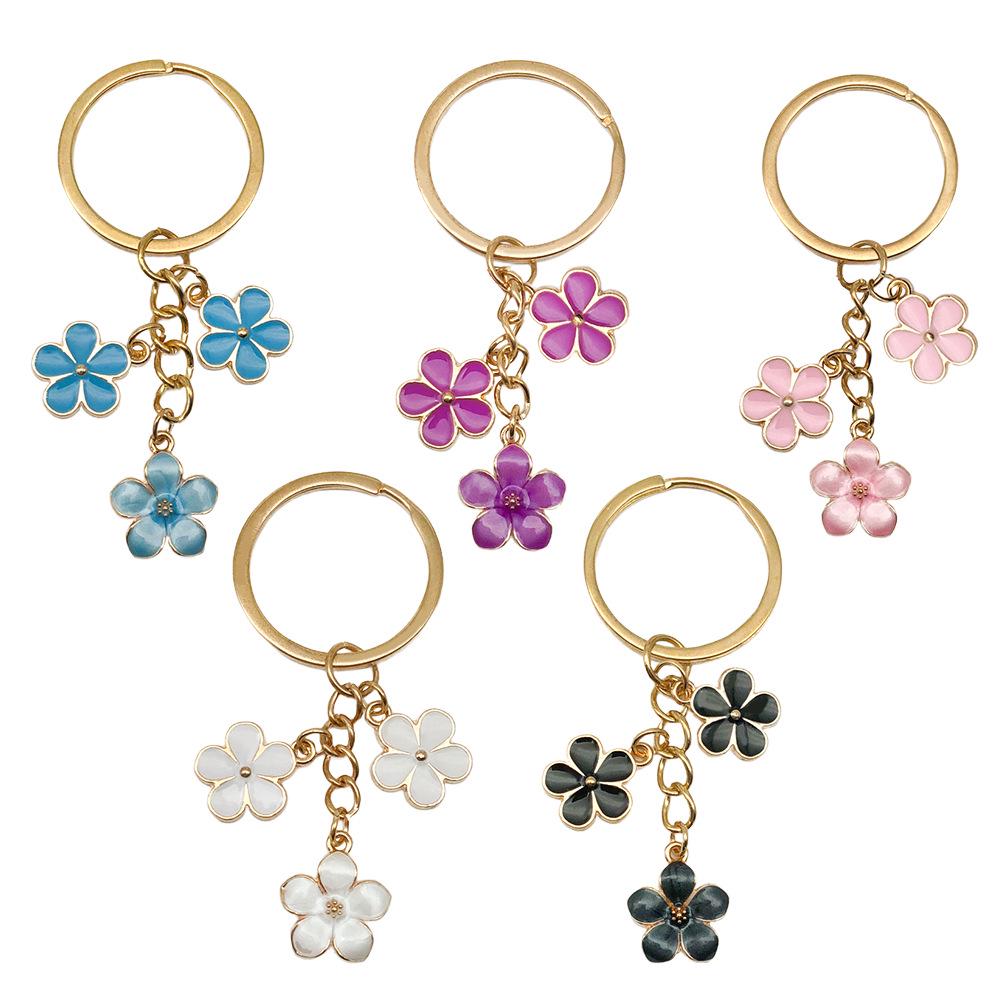 Sakura Oil Drop Keychain – Available in Black, White, Blue, Pink, Purple | Multiple Colors and Metal Parts | Luggage Accessory