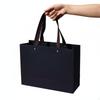 Schwarze Papiergeschenktüte Elegantes Design mit Henkeln Dickes Kartonmaterial für Herren,