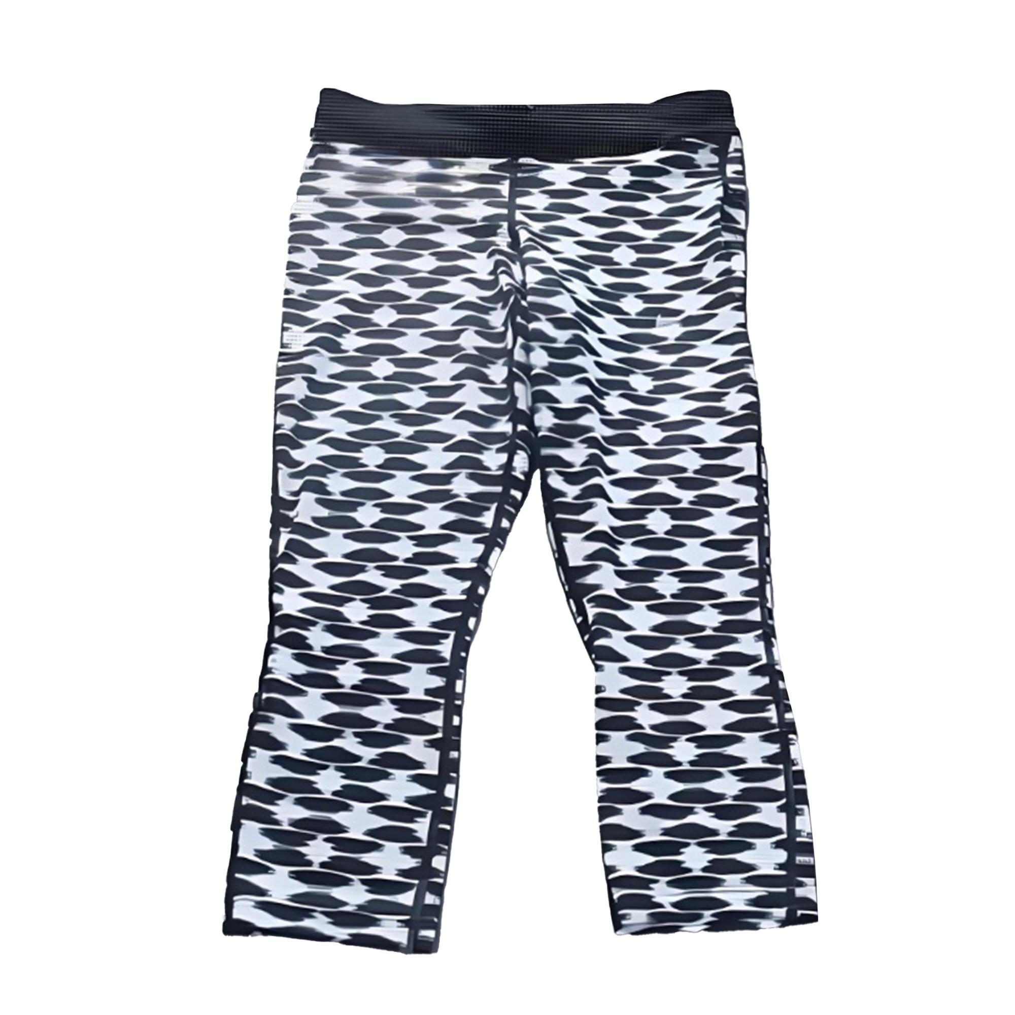 

Nike Dri-Fit Комфортные спортивные шорты три четверти на шнуровке с принтом по всей поверхности Женские шорты 645611-011 S