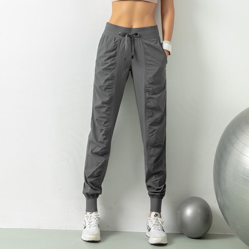 Women's Quick-Dry Yoga Fitness Nine-Point Cuffed Pants with Pockets