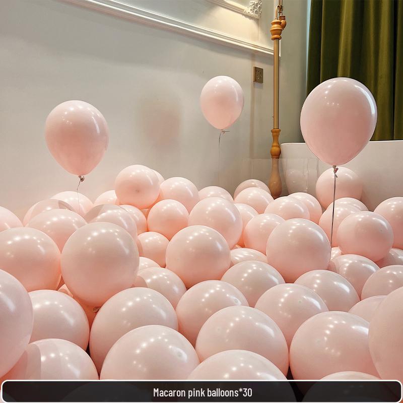 

Helium-filled pink and metallic balloons with sequins for birthday or proposal room decor.
