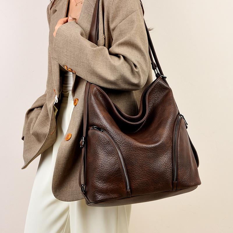 2025 новый нишевый ретро трендовый большой вместимости повседневный мягкий кожаный женский наплечный кроссбоди многофункциональный рюкзак женская сумка