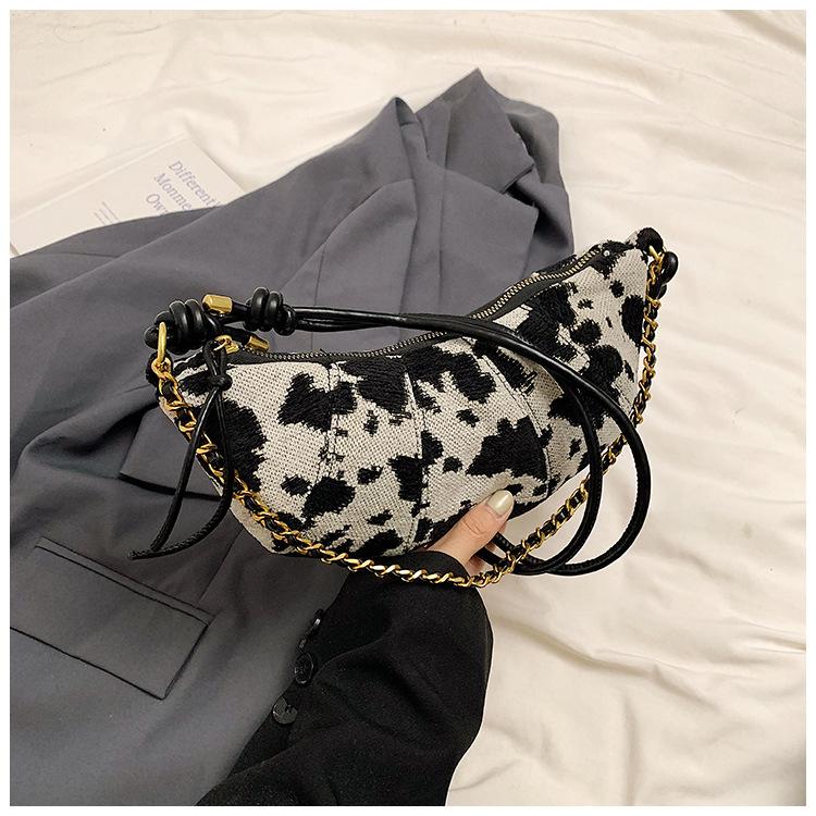 

Новая модная маленькая сумка женская в иностранном стиле с коровьим принтом, сумка-круассан нишевого дизайна, сумка-мессенджер на одно плечо, тренд чёрный