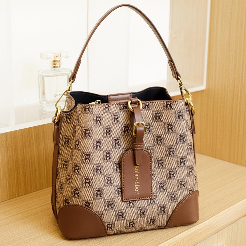 

Премиальная сумка нишевого дизайна в стиле легкой роскоши, новая популярная сумка-ведро, широкий плечевой ремень, универсальная сумка-мессенджер на одно плечо коричневый