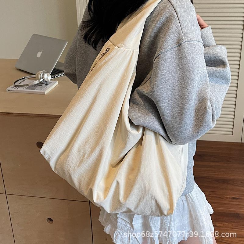 2025 New Large Capacity Versatile Portable Canvas Bag Premium Sense Tote Bag Fashion Commuter Underarm Shoulder Bag Women
