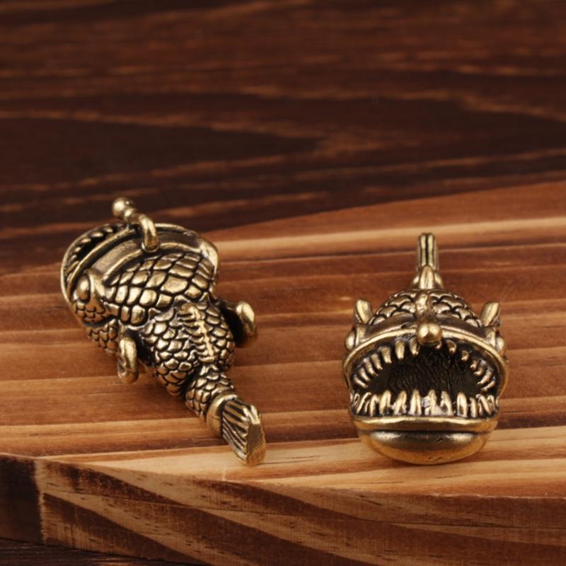 Elegant Brasses Lanterns Fish Figurine as Tabletops Decoration Adding Retros Charm to Interior Space