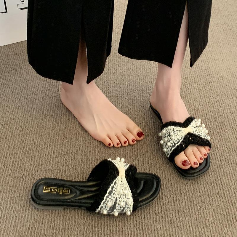 French small fragrant pearl slippers women's summer wear 2025 new fashion and leisure one-word flat-bottomed beach cool slippers