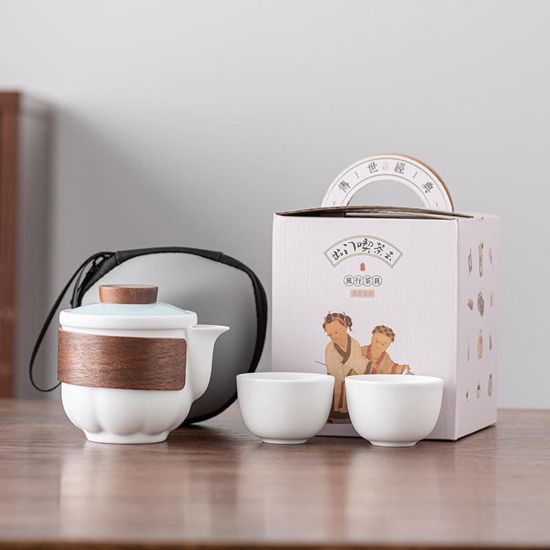 

Five famous kiln travel tea sets Ru kiln official kiln portable set outdoor express guest one pot two cups gift box