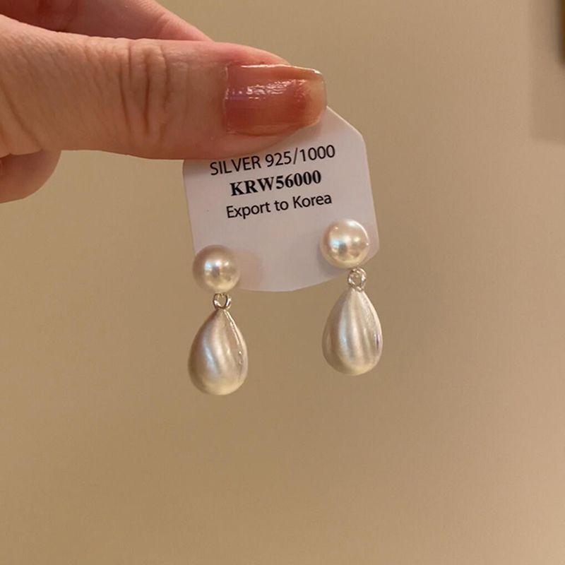 

Silver Brushed Water Drop Imitation Pearl Tassel Earrings 2025 New Arrival Best Selling Niche Temperament Ear Studs Fall and Winter Fancy Silver