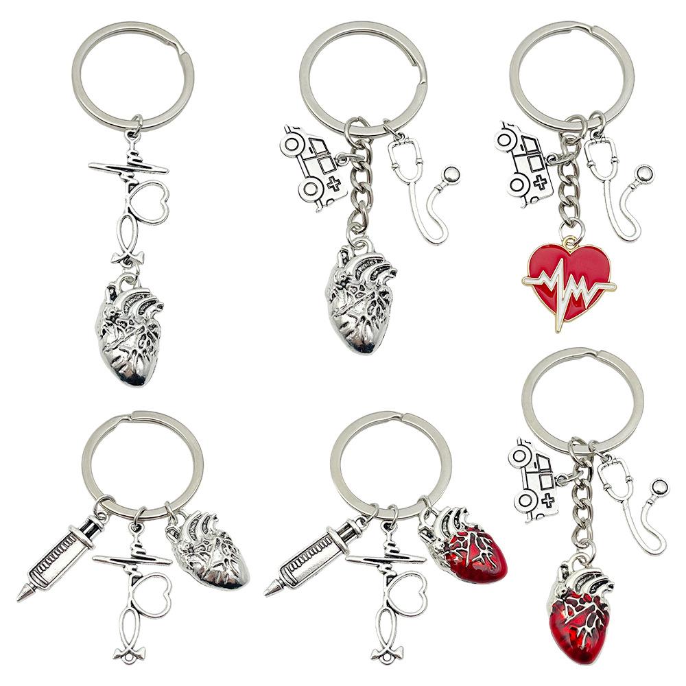 Antique Silver Medical Series Keychain: Syringe, Stethoscope, Heart, Ambulance, and ECG Zinc Alloy Pendant