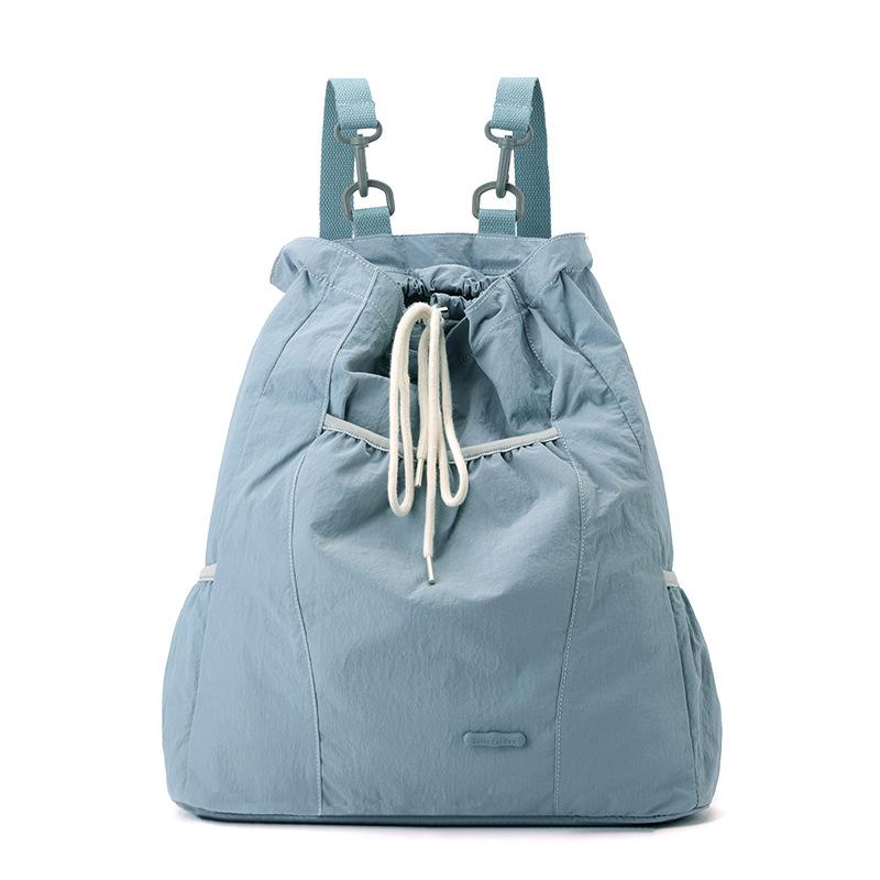 Niche design women's casual backpack college wind lightweight drawstring backpack