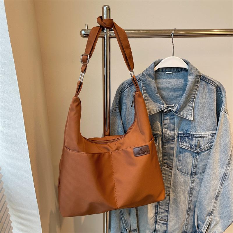 Lightweight canvas bag bag Large capacity women's shoulder messenger bag College student class schoolbag Casual fashion Japanese college