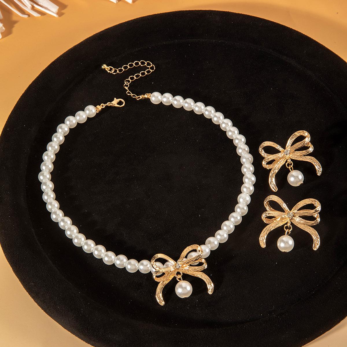 Light luxury alloy bow collarbone chain jewelry, imitation pearl beaded necklace set