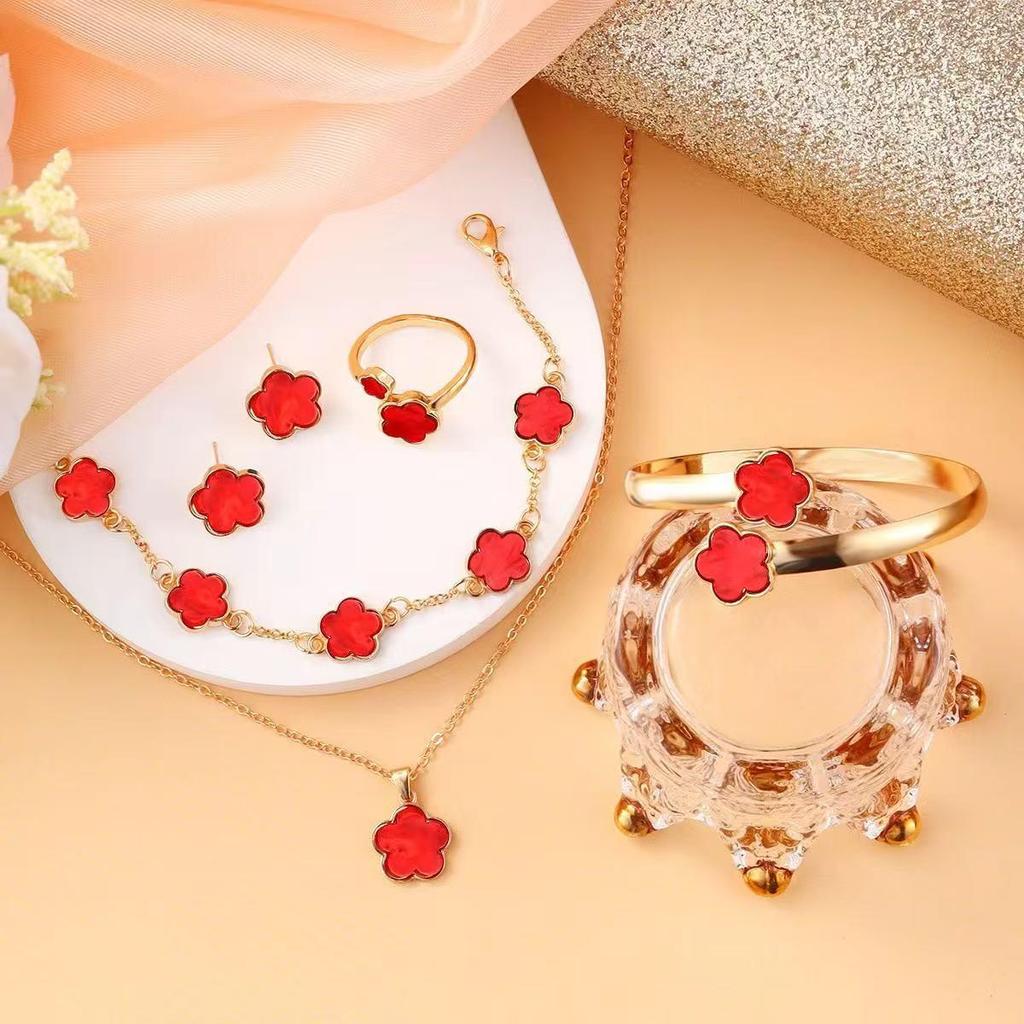 Elegant 5-Piece Flower Jewelry Set: Necklace, Bracelet, Earrings, and Ring.