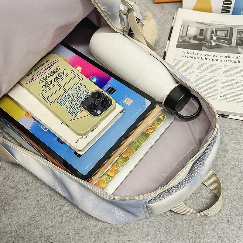 Der neue Schulranzen ist hochwertig, frisch und süß, ein Rucksack mit literarischem Graffiti-Tie-Dye und ein leichter Rucksack für Junior- und Oberstufenschüler.