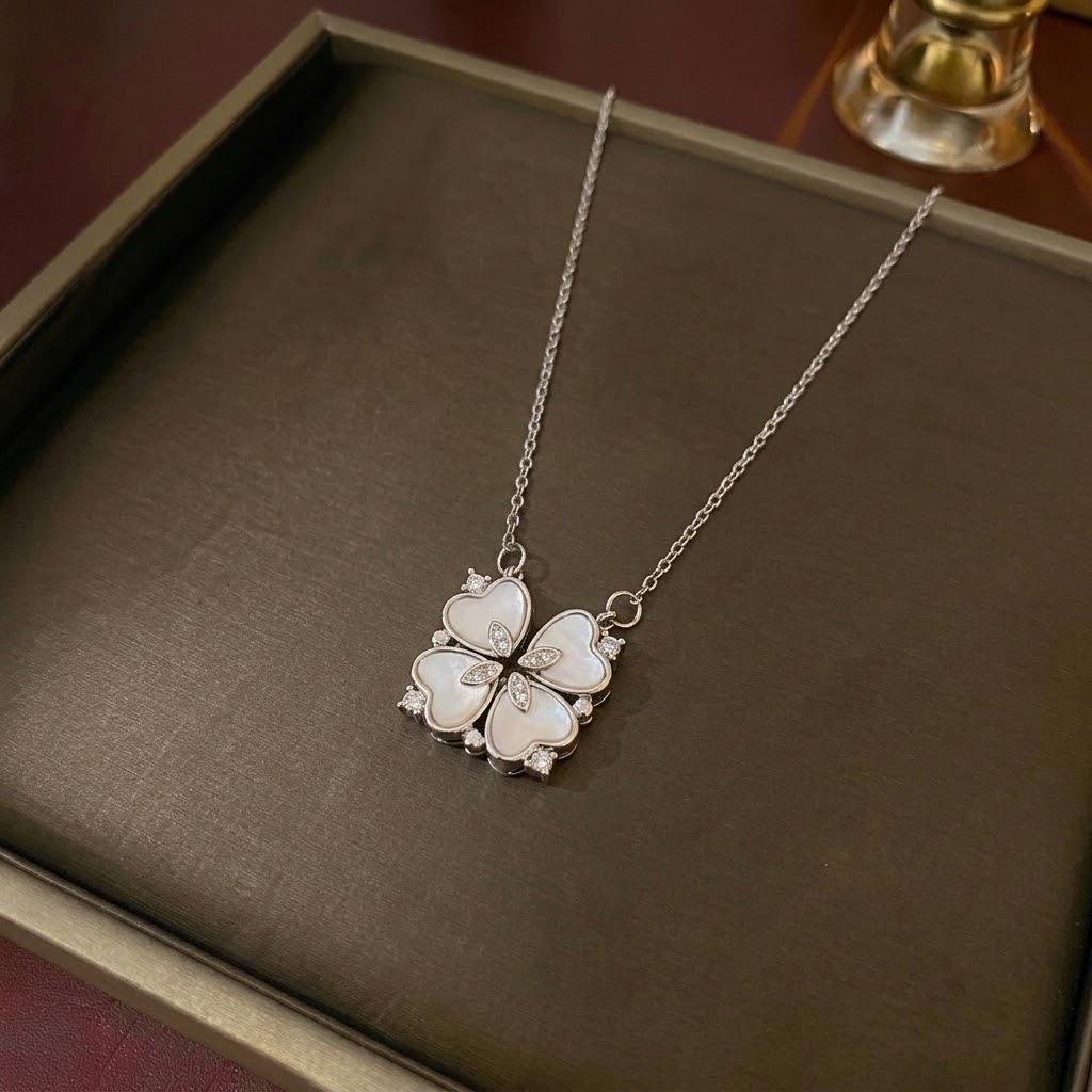 Women's Heart-Shaped Necklace with Four-Petal Flower, Cubic Zirconia, Titanium Steel Clavicle Chain - Elegant and Versatile Accessory