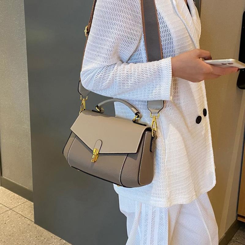 Fashion Commuting Versatile Hand held Crossbody Bag with Cowhide Temperament  Leather Shoulder Straps  Genuine Leather Women's Bag