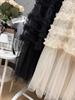 Spring 2026 Women's Irregular Layered Mesh Skirt: Long, Slimming Gauze Design, Heavy Work Detail.