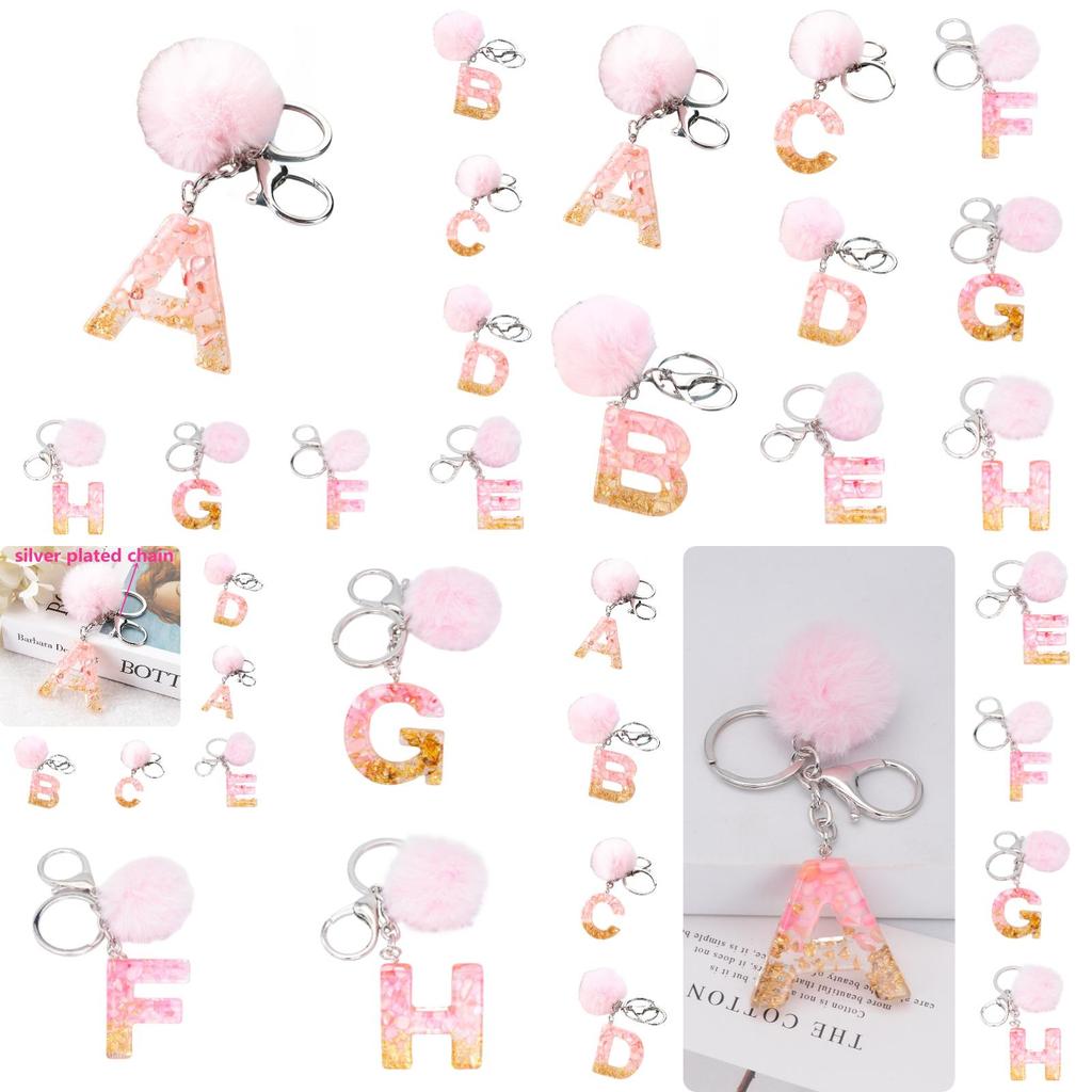 Modischer Schlüsselanhänger mit Plüschball und englischen Buchstaben Kreatives Autozubehör