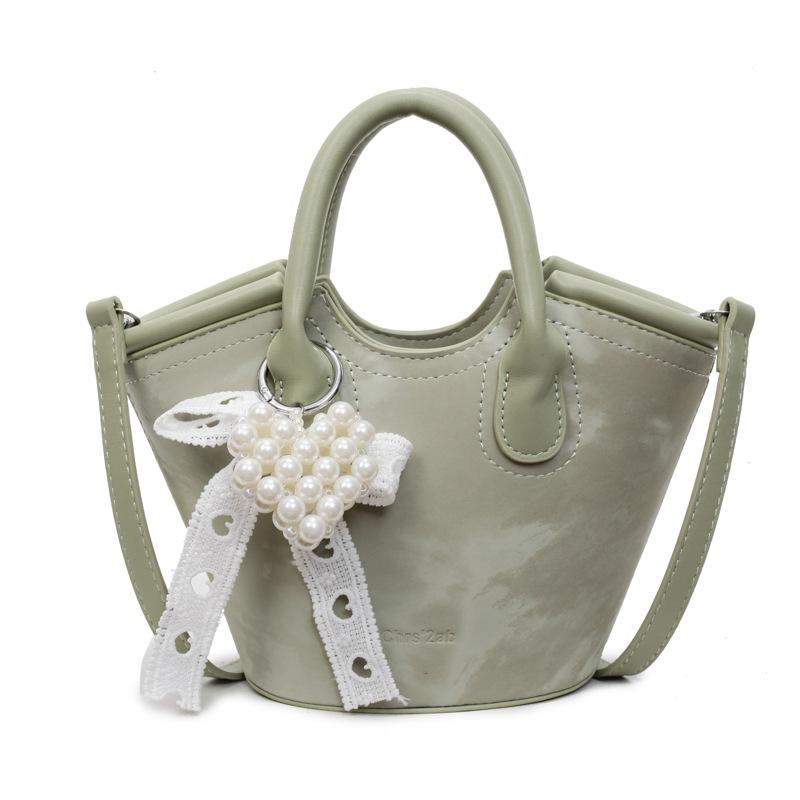 

Premium sense hand carrying bucket bag women 2025 summer new lace pearl small satchel versatile trendy fashion shoulder bag зелёный