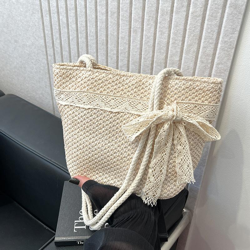 Fashion hand-woven shoulder bag, new large-capacity bag, female tote vacation beach niche bucket straw bag
