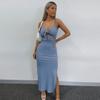 Modisches, schlichtes, ärmelloses Trägerkleid aus Strick für Frühling und Sommer, mit tiefem Rückenausschnitt und sexy langem Rock mit Ausschnitt.