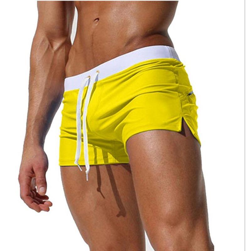 Men's solid color sexy and fashionable back pocket design, beach breathable quick-drying pants, boxer beach pants, swimming trunks.