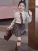 Girls' 2025 British Style Three-Piece Set: Mid-Length Trench Coat, Pleated Skirt, and Jacket for Spring/Autumn - New College Fashion.