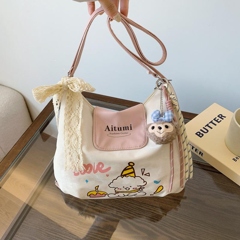 New cute foreign style niche fashion simple commuting texture versatile shoulder bag 2025 summer new women's bag tide