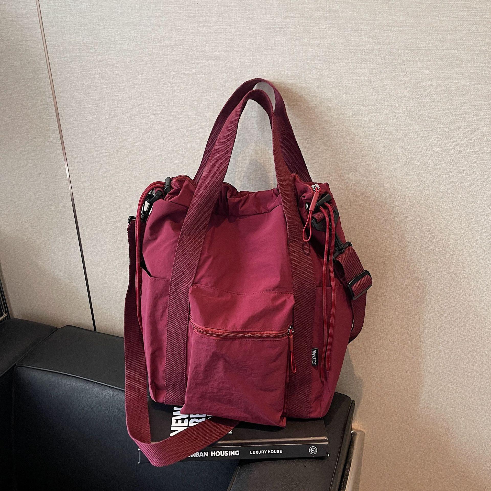 

New tooling wind backpack women s shoulder single shoulder crossbody large capacity handbag commuter versatile simple three-purpose bag кирпич красный