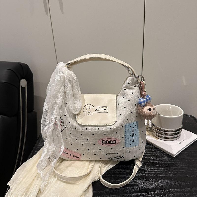 Fashion trendy polka dot 2025 large-capacity pendant summer new large-capacity Korean version commuter double shoulder underarm shoulder bag