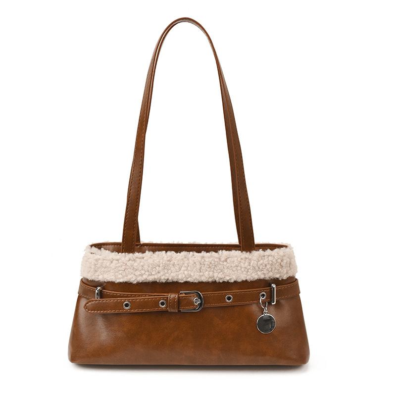 Lamb wool splicing shoulder bag women's 2025 autumn and winter new women's versatile commuter niche baguette armpit bag