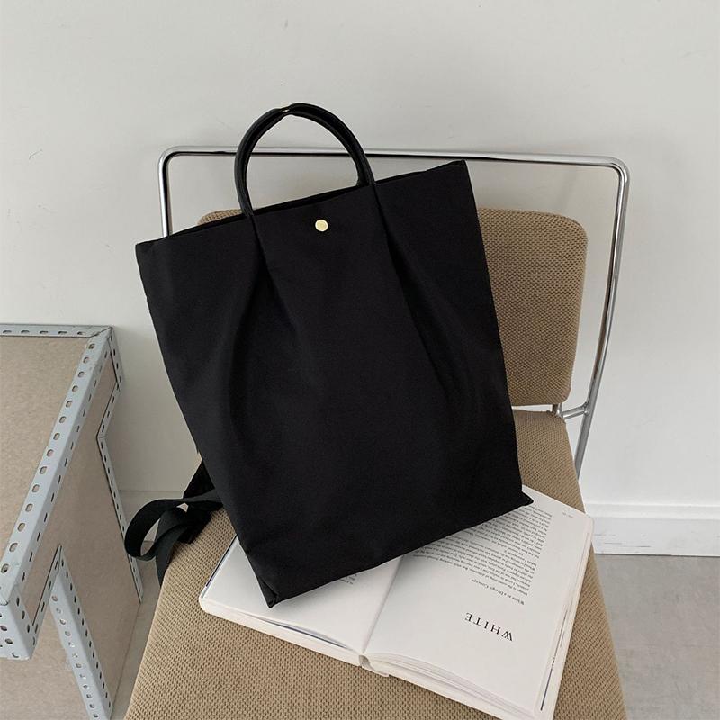 

Japanese Minimalist Backpack Lightweight And Large-capacity Nylon Tote Bag Daily Casual Commuter Bag Waterproof Laptop Bag чёрный
