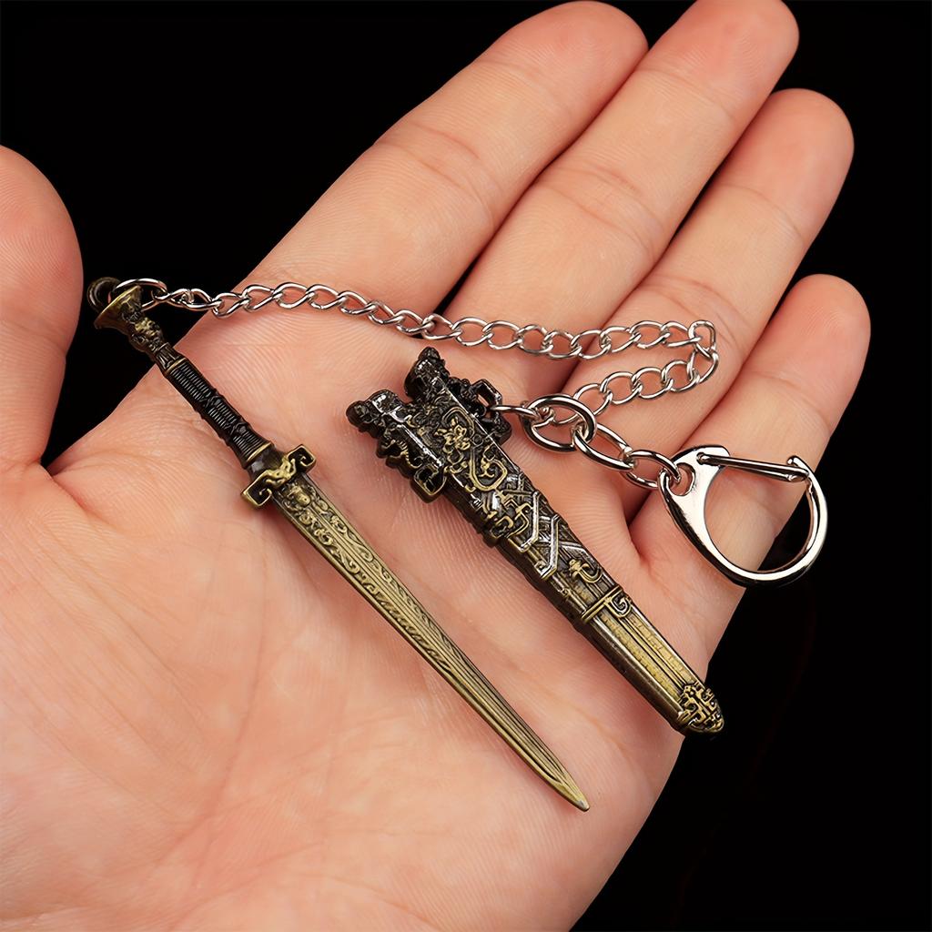 1Pcs Sword Shape Keychains, Keychain Pendants for Outdoor Enthusiasts and Collectors, with Various Designs