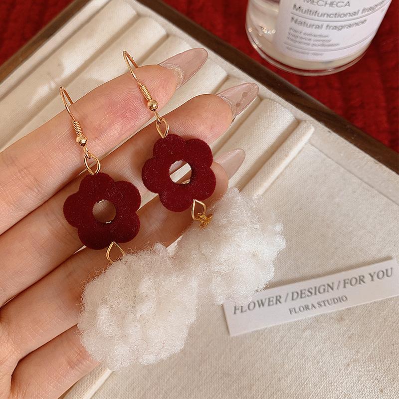 Autumn and winter red new hairball earrings women s high-end temperament versatile festive earrings niche Christmas earrings