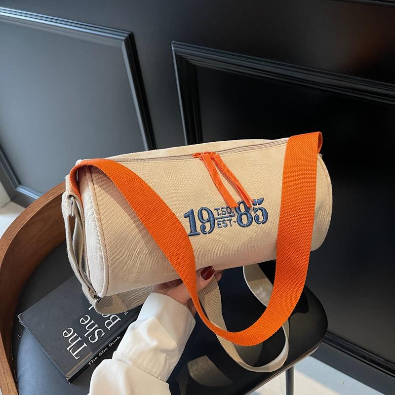 Simple bag 2025 new cylinder bag women's bag messenger bag canvas bag Oxford cloth casual small shoulder bag trend