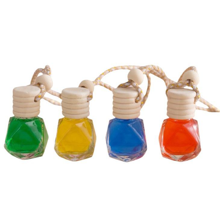 Car Interior Perfume Hanging Ornament - Long-Lasting Air Freshener & Aroma Diffuser for Rearview Mirror.