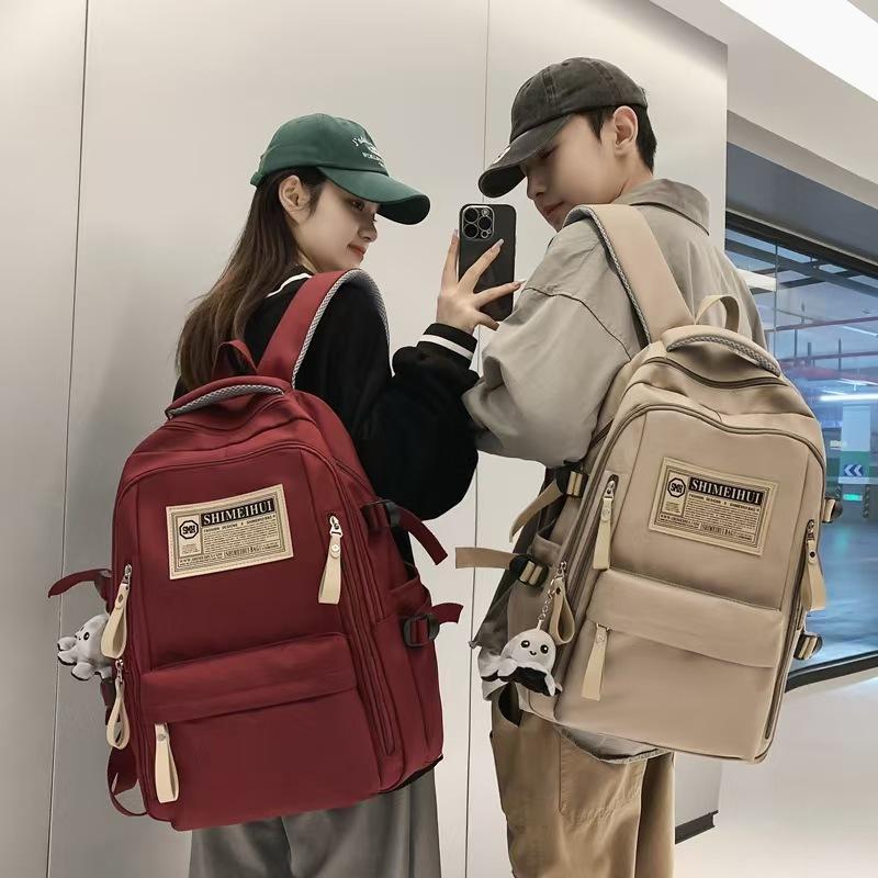 New schoolbag waterproof middle school student large-capacity solid color backpack female high school student Oxford cloth backpack casual versatile