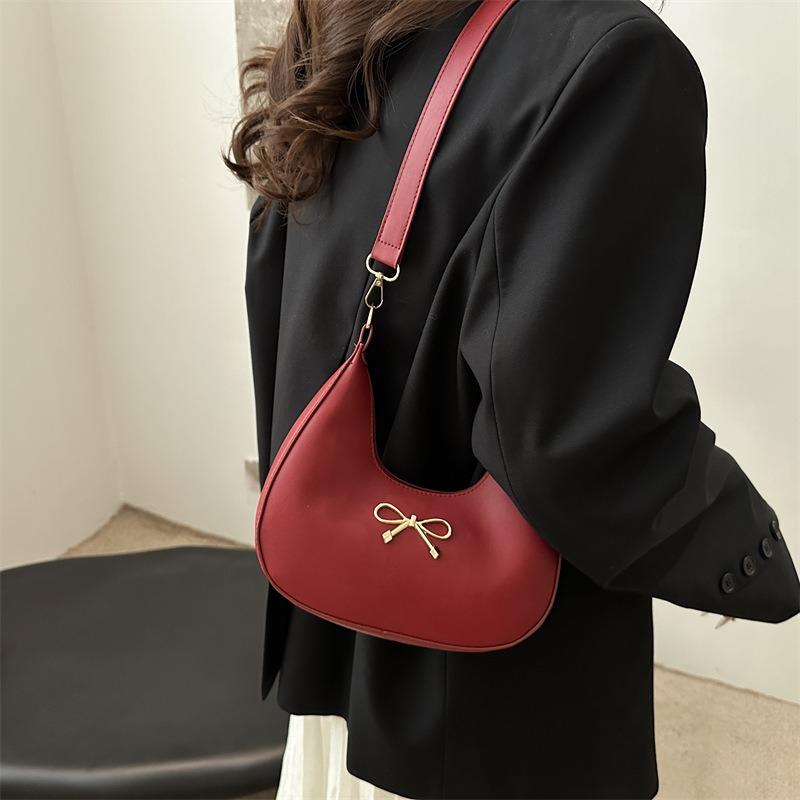 New Temperament Women's Bag Shoulder Bag Bow Decorative Design Crescent Bag Simple Niche Women's Bag