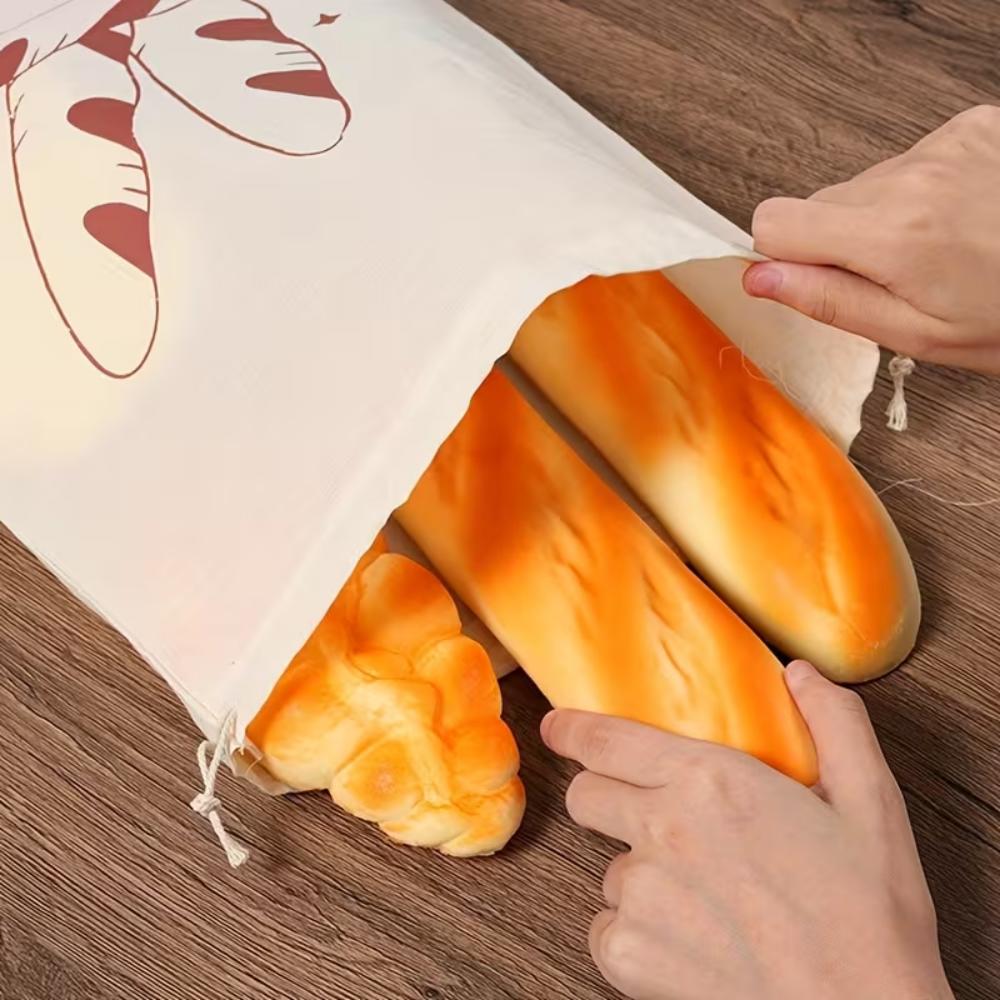 A reusable linen bread storage bag - an unbleached drawstring bag for the natural storage of homemade bread and pastries