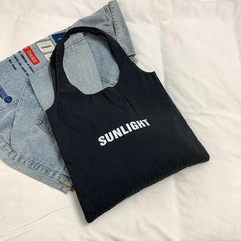 

Autumn commuter macaron shoulder bag women s 2025 new casual fashion tote bag simple bag shopping bag чорний