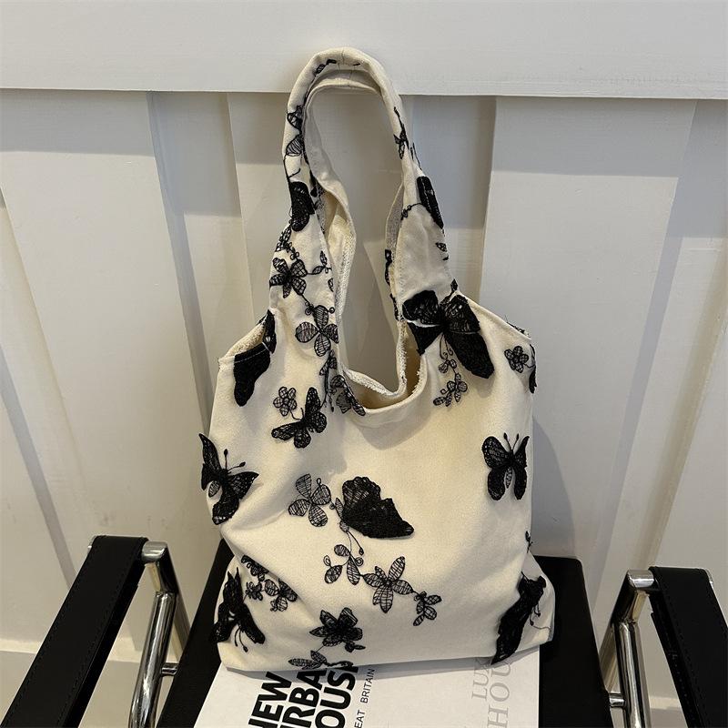 Super Wind Underarm Fashion Bag Women's Three-dimensional Black Butterfly Canvas Bag Leisure Travel Literature and Art Large Capacity