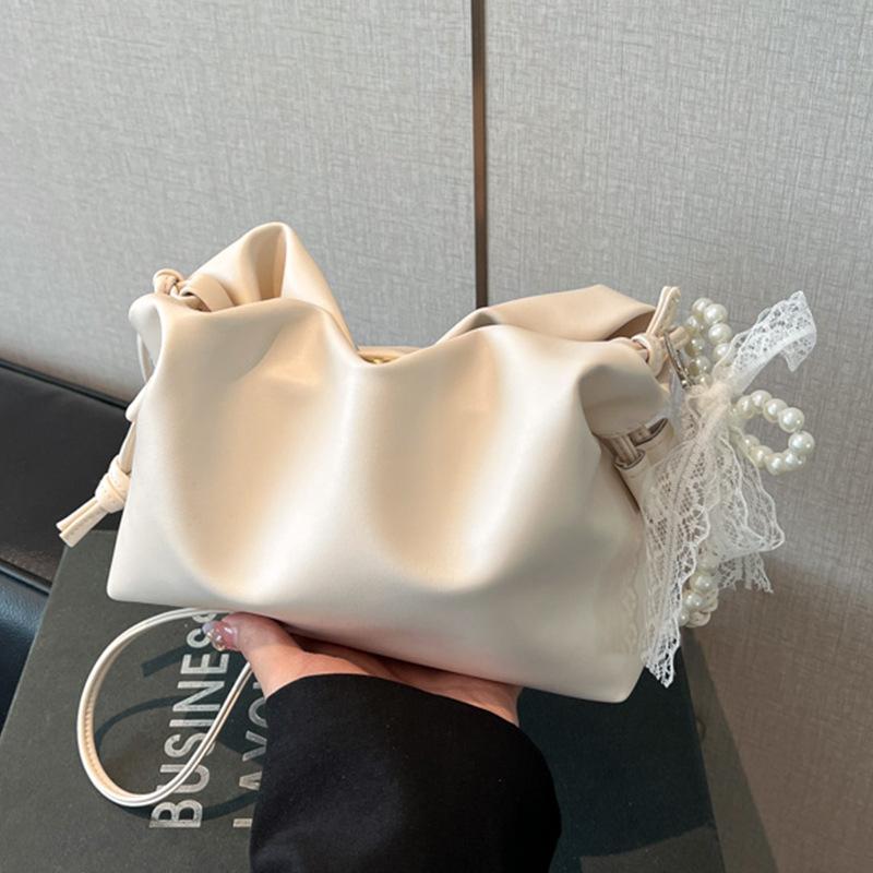 Super Fire Niche Milk Yellow Bag Women's 2025 New Trendy and Popular Versatile Messenger Bag Fashion Temperament Pleated Bucket Bag