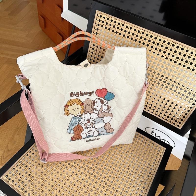 

2 Soft and cute embroidered quilting cotton messenger bag Large capacity portable shopping commuter handbag