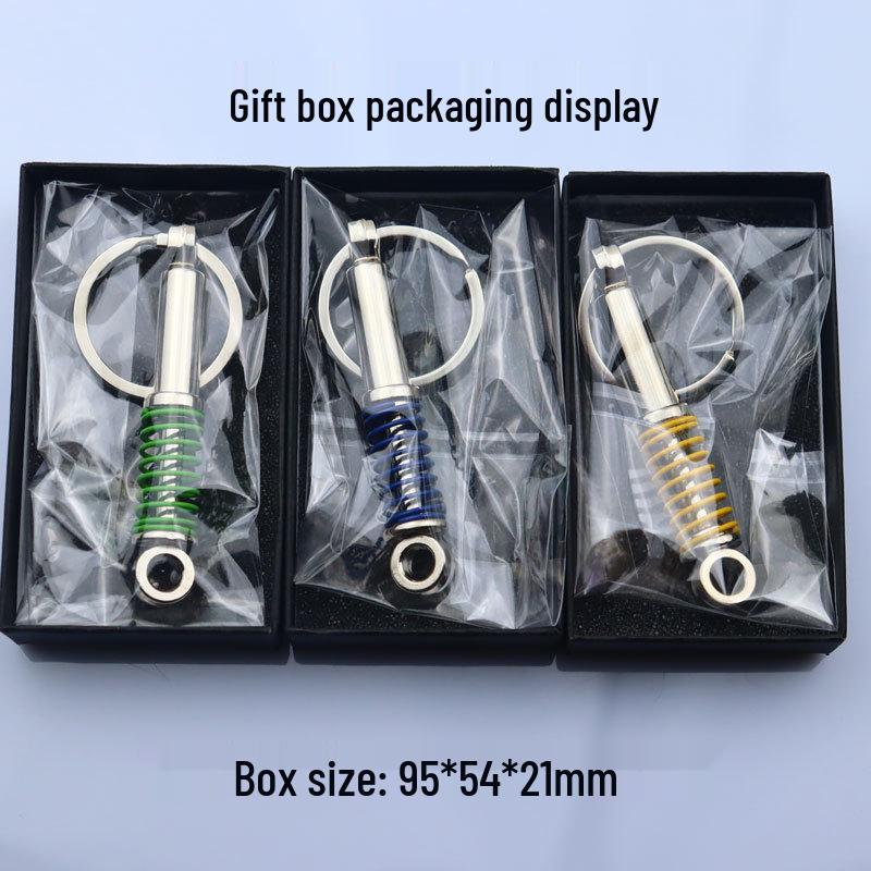 Creative Metal Car Accessories: Shock Absorber Keychain & Suspension Pendant Ring