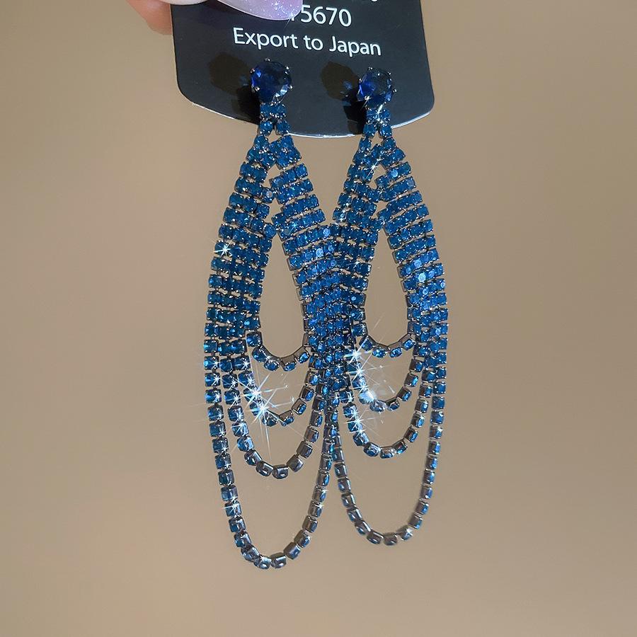 Silver Needle Water Drop Tassel Earrings - Light Luxury High-End Design for Women's Fashion.