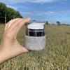 Rhinestone-Embellished Travel-Size Face & Eye Cream Bottles - High Aesthetic Design