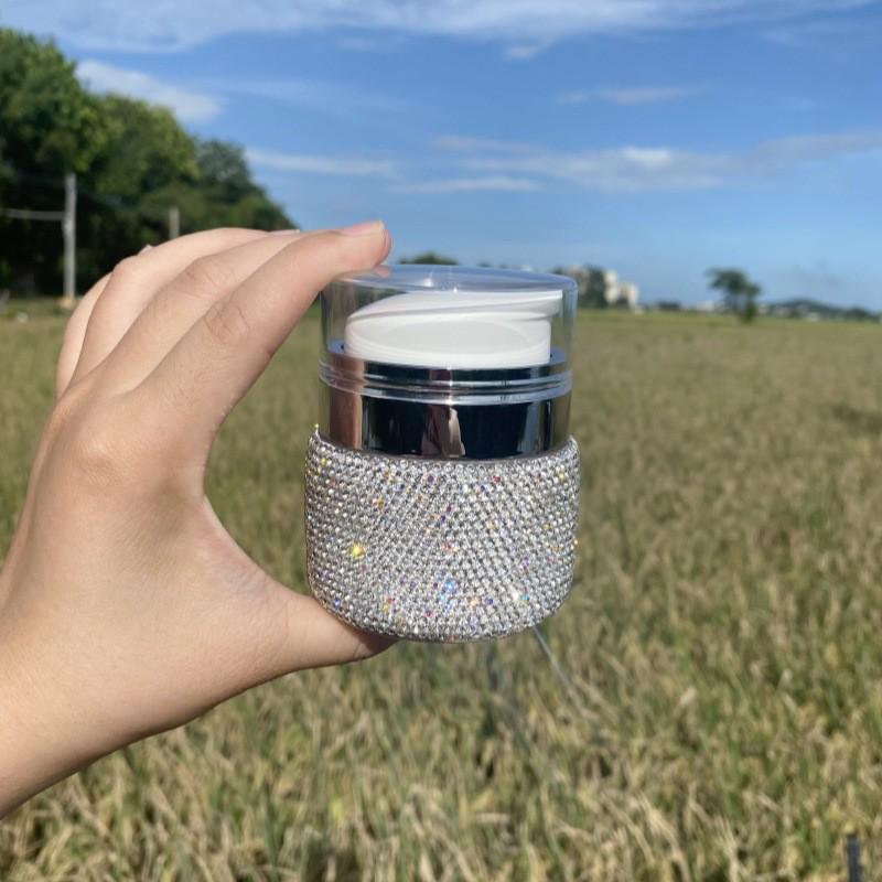 Rhinestone-Embellished Travel-Size Face & Eye Cream Bottles - High Aesthetic Design
